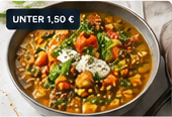 Linsen-Dal mit Reis und Kräutern in einer Schale